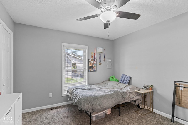 401 N Nicole Ln, Scottsburg, IN 47170 - carpeted bedroom with a textured ceiling and ceiling fan