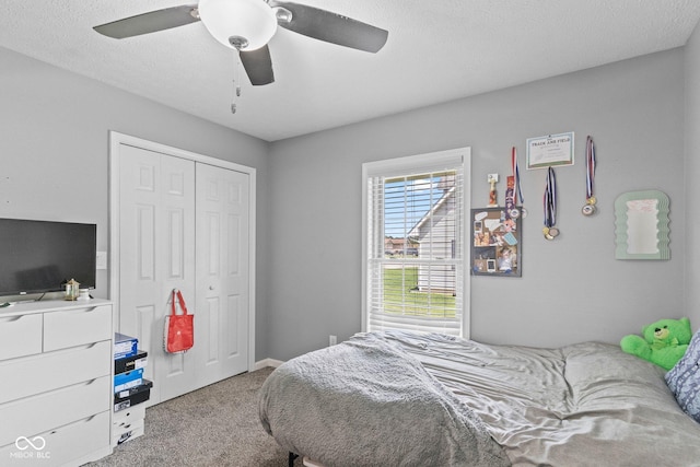 401 N Nicole Ln, Scottsburg, IN 47170 - carpeted bedroom featuring a closet, ceiling fan, and a textured ceiling