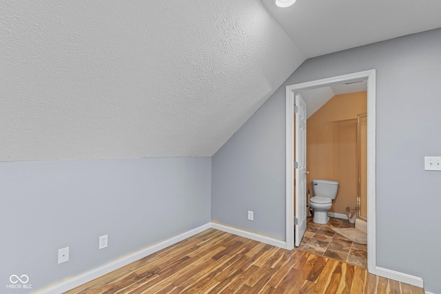 401 N Nicole Ln, Scottsburg, IN 47170 - bonus room featuring lofted ceiling, wood finished floors, and a textured ceiling