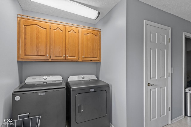 401 N Nicole Ln, Scottsburg, IN 47170 - laundry room with cabinet space, washer and dryer, and a textured ceiling