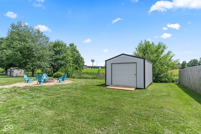 401 N Nicole Ln, Scottsburg, IN 47170 - view of yard featuring a storage unit and a fire pit