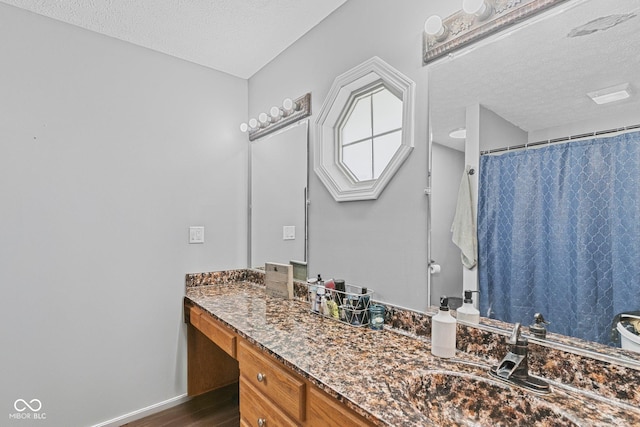 401 N Nicole Ln, Scottsburg, IN 47170 - bathroom with a textured ceiling, vanity, wood finished floors, and a shower with curtain
