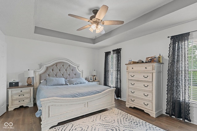 401 N Nicole Ln, Scottsburg, IN 47170 - bedroom with multiple windows, dark wood finished floors, and a raised ceiling