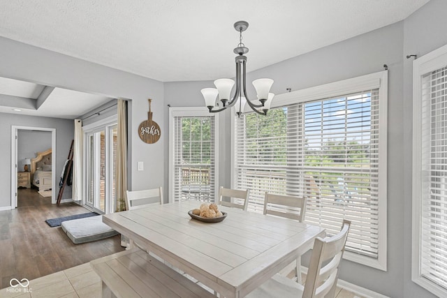 401 N Nicole Ln, Scottsburg, IN 47170 - dining room featuring a chandelier and wood finished floors