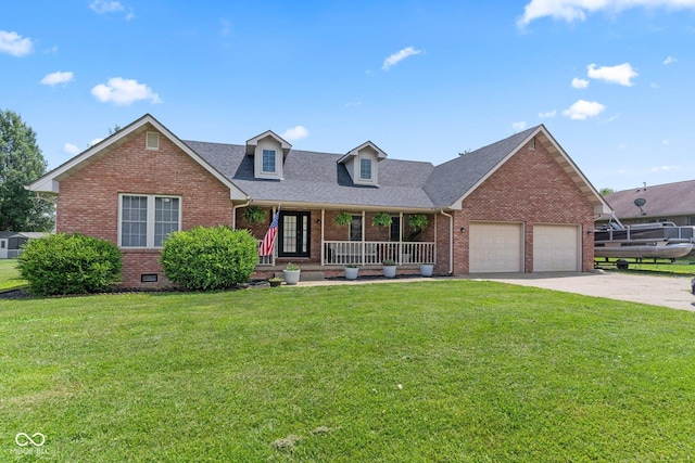 401 N Nicole Ln, Scottsburg, IN 47170 - view of front of property featuring brick siding, a porch, an attached garage, concrete driveway, and a front lawn