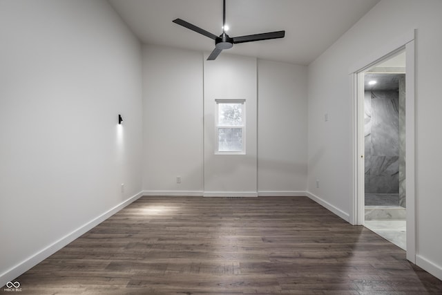 4245 Norwaldo Ave, Indianapolis, IN 46205 - unfurnished room with ceiling fan and dark wood-style floors
