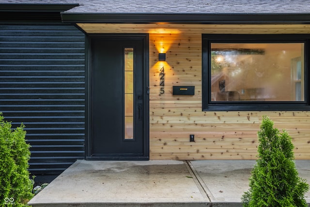 4245 Norwaldo Ave, Indianapolis, IN 46205 - entrance to property with a shingled roof