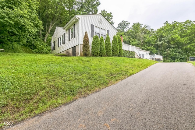 8783 State Road 56, Aurora, IN 47001 - view of property exterior with a yard