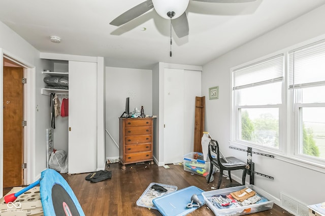 8783 State Road 56, Aurora, IN 47001 - bedroom featuring wood finished floors and ceiling fan