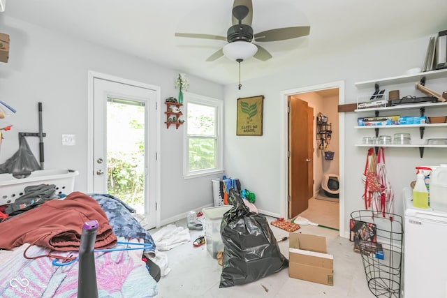 8783 State Road 56, Aurora, IN 47001 - bedroom with access to outside, washer / clothes dryer, and a ceiling fan