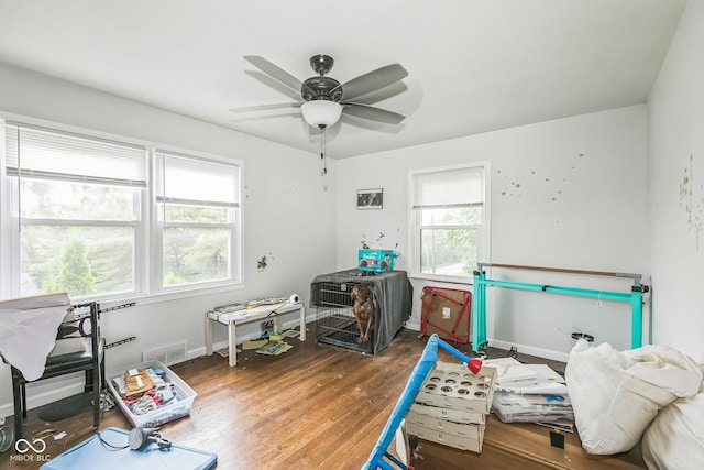 8783 State Road 56, Aurora, IN 47001 - bedroom with wood finished floors and ceiling fan