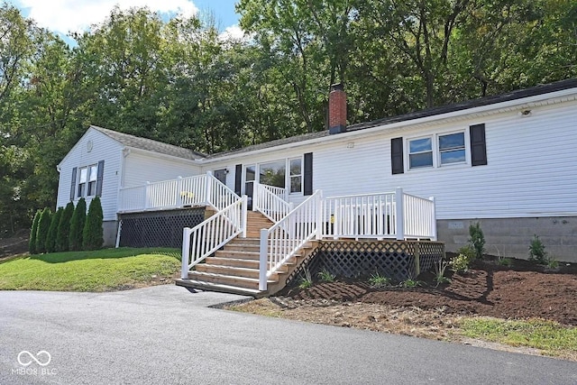 8783 State Road 56, Aurora, IN 47001 - view of front facade with a chimney and stairway