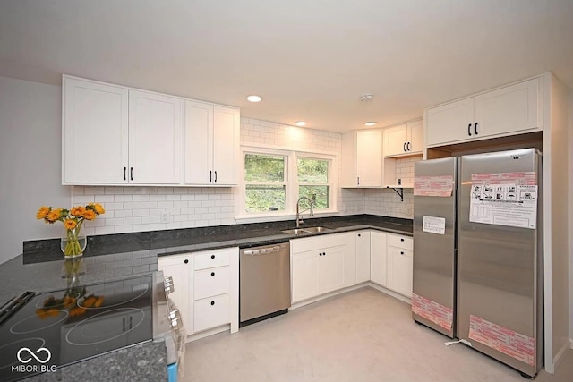 8783 State Road 56, Aurora, IN 47001 - kitchen with stainless steel appliances, white cabinets, decorative backsplash, and recessed lighting