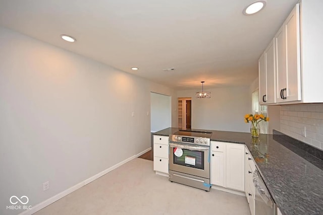 8783 State Road 56, Aurora, IN 47001 - kitchen featuring stainless steel appliances, a peninsula, white cabinetry, recessed lighting, and tasteful backsplash