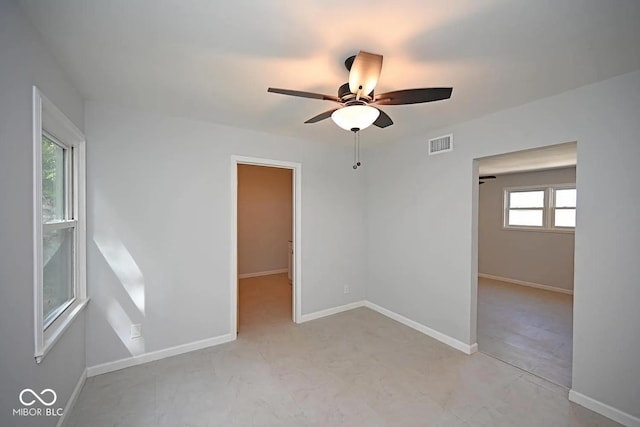8783 State Road 56, Aurora, IN 47001 - unfurnished room with a ceiling fan and baseboards