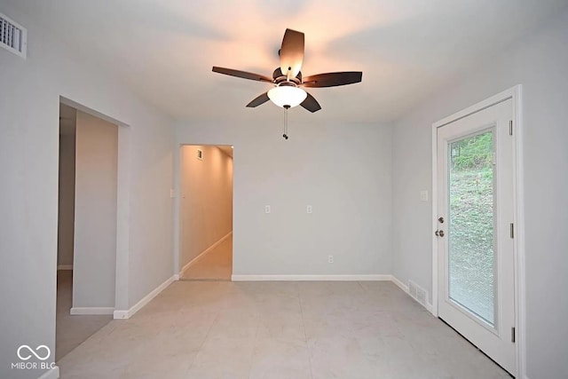 8783 State Road 56, Aurora, IN 47001 - unfurnished room featuring ceiling fan and baseboards
