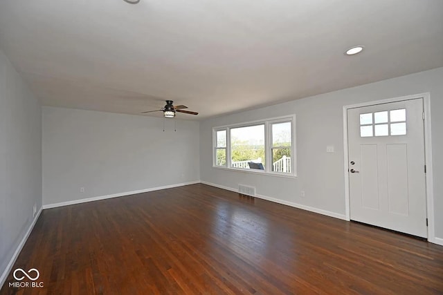 8783 State Road 56, Aurora, IN 47001 - foyer entrance with a ceiling fan and dark wood-type flooring