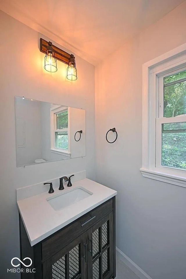 8783 State Road 56, Aurora, IN 47001 - bathroom with vanity and baseboards