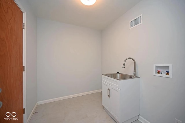 8783 State Road 56, Aurora, IN 47001 - laundry room featuring a sink and hookup for a washing machine