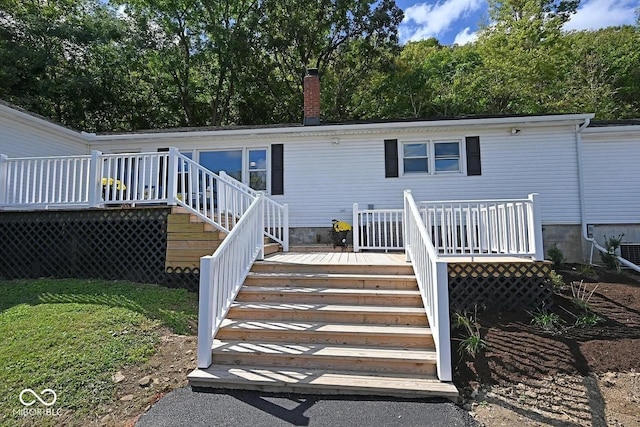 8783 State Road 56, Aurora, IN 47001 - back of house featuring stairway, a wooden deck, and a chimney