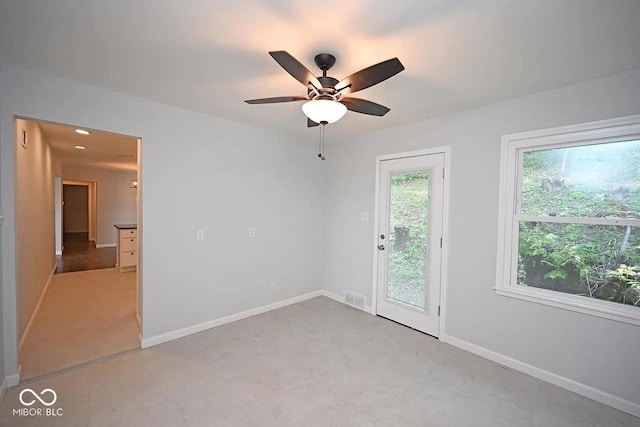 8783 State Road 56, Aurora, IN 47001 - empty room with baseboards and a ceiling fan