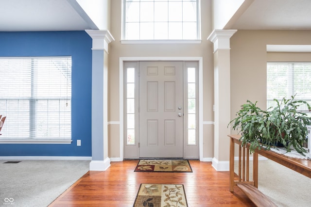 1521 Midnight Pass, Brownsburg, IN 46112 - entrance foyer featuring ornate columns and light wood-style floors