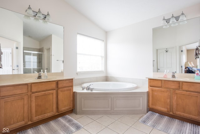 1521 Midnight Pass, Brownsburg, IN 46112 - bathroom featuring vaulted ceiling, tile patterned flooring, a stall shower, two vanities, and a bath