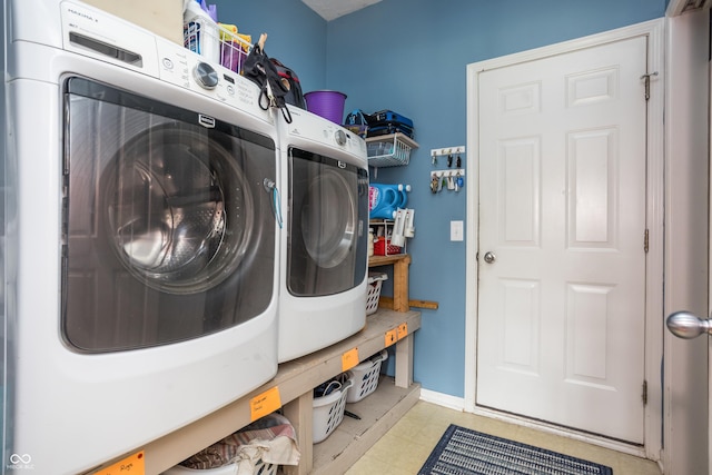 1521 Midnight Pass, Brownsburg, IN 46112 - laundry room with washing machine and clothes dryer and baseboards