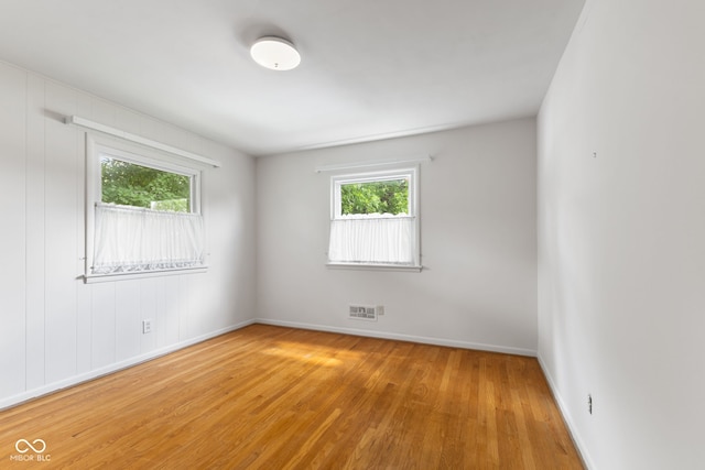 3388 S Leonard Rd, New Palestine, IN 46163 - spare room with light wood-type flooring and baseboards