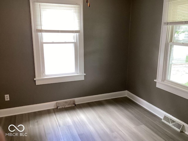 360 Laclede St, Indianapolis, IN 46241 - empty room featuring wood finished floors and baseboards