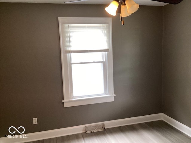 360 Laclede St, Indianapolis, IN 46241 - empty room featuring a ceiling fan and wood finished floors