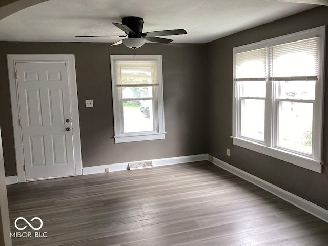 360 Laclede St, Indianapolis, IN 46241 - empty room with ceiling fan and wood finished floors