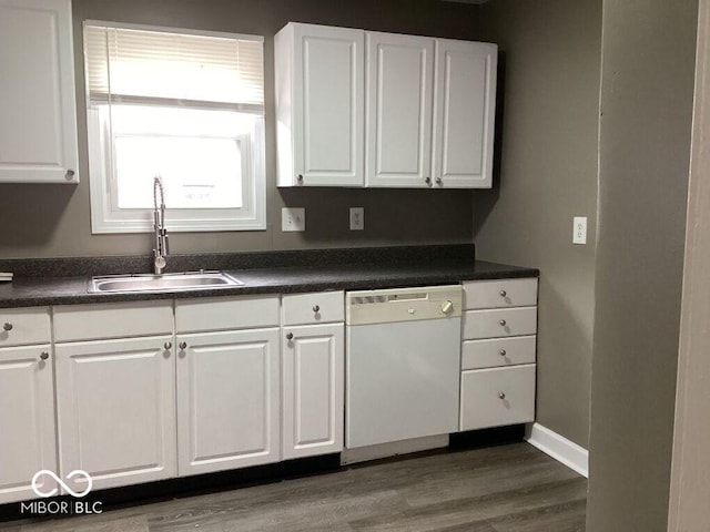 360 Laclede St, Indianapolis, IN 46241 - kitchen with white dishwasher, dark countertops, white cabinetry, and dark wood finished floors