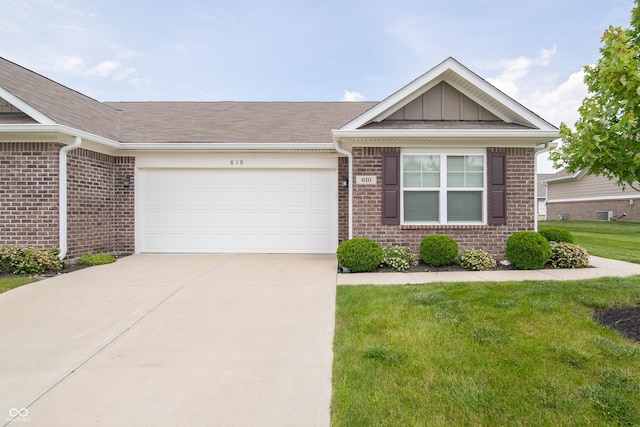 610 Sawtooth St, Westfield, IN 46074 - ranch-style home featuring brick siding, an attached garage, and driveway