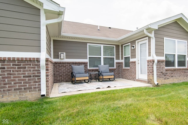 610 Sawtooth St, Westfield, IN 46074 - rear view of house featuring a patio area, brick siding, and a yard