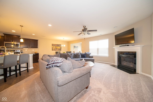 610 Sawtooth St, Westfield, IN 46074 - living area featuring ceiling fan, recessed lighting, and a fireplace with flush hearth