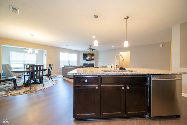 610 Sawtooth St, Westfield, IN 46074 - kitchen with dishwasher, wood finished floors, dark brown cabinets, open floor plan, and a ceiling fan