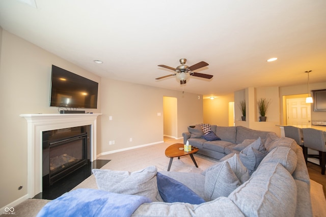 610 Sawtooth St, Westfield, IN 46074 - living area with recessed lighting, a ceiling fan, carpet flooring, and a fireplace with flush hearth