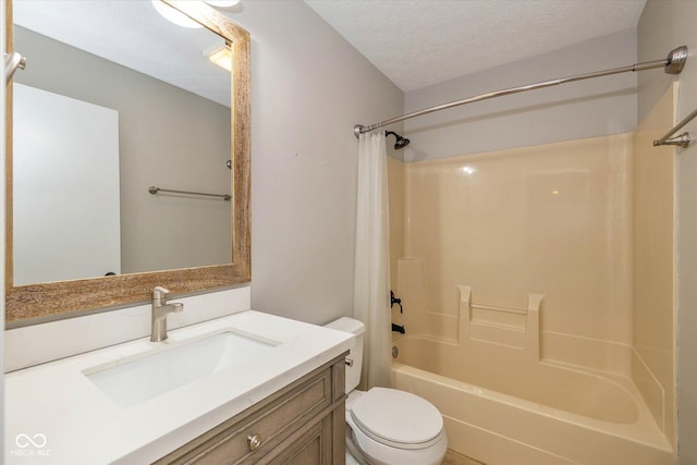 12661 Doe Ln, Indianapolis, IN 46236 - bathroom featuring shower / bath combo with shower curtain, vanity, and a textured ceiling