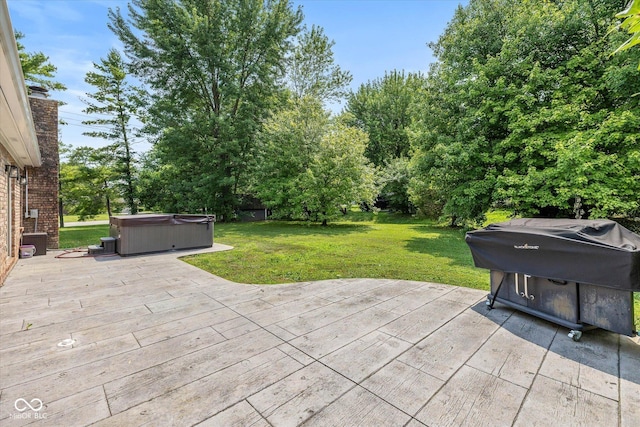 12661 Doe Ln, Indianapolis, IN 46236 - deck with a hot tub, grilling area, a yard, and a patio area