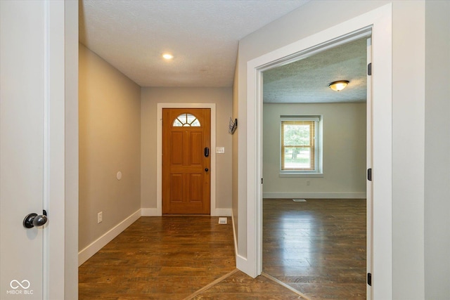 12661 Doe Ln, Indianapolis, IN 46236 - foyer with dark wood-type flooring, a textured ceiling, and recessed lighting
