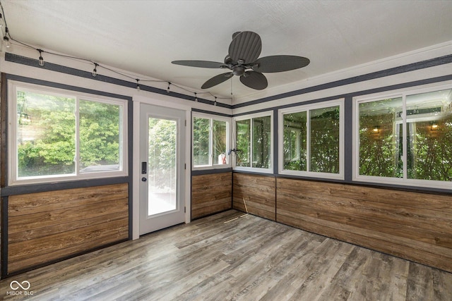 12661 Doe Ln, Indianapolis, IN 46236 - unfurnished sunroom featuring wood finished floors