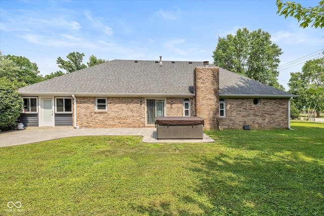 12661 Doe Ln, Indianapolis, IN 46236 - rear view of house featuring a hot tub, a patio area, and brick siding