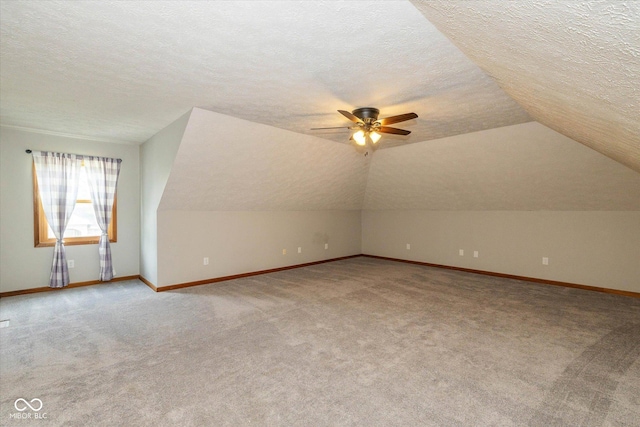 12661 Doe Ln, Indianapolis, IN 46236 - bonus room featuring a textured ceiling, light carpet, a ceiling fan, and lofted ceiling