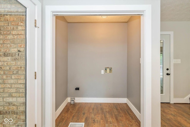 12661 Doe Ln, Indianapolis, IN 46236 - laundry room featuring wood finished floors, hookup for a washing machine, and electric dryer hookup