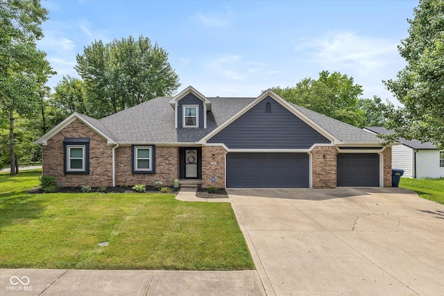 12661 Doe Ln, Indianapolis, IN 46236 - view of front of property featuring a garage, a front yard, driveway, roof with shingles, and brick siding