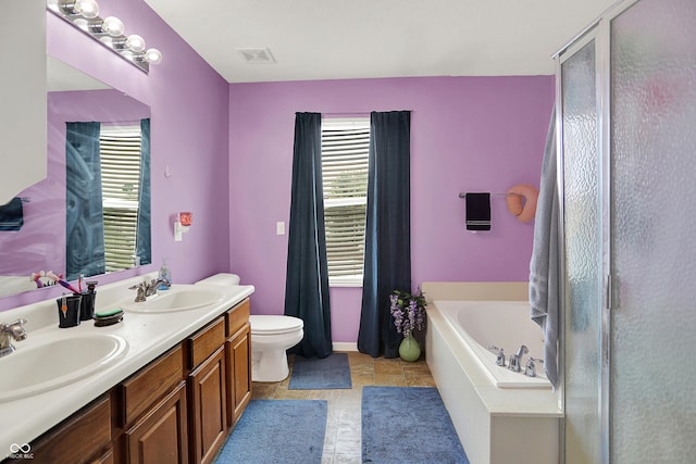 5063 Haywood Ln, Plainfield, IN 46168 - full bath with double vanity, a garden tub, and a shower with door