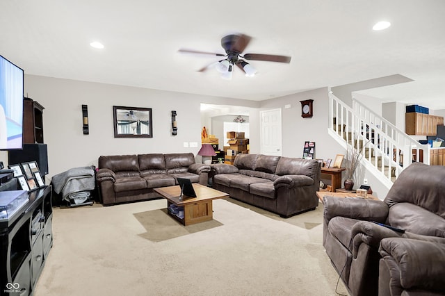 5063 Haywood Ln, Plainfield, IN 46168 - living room with light carpet, stairway, a ceiling fan, and recessed lighting