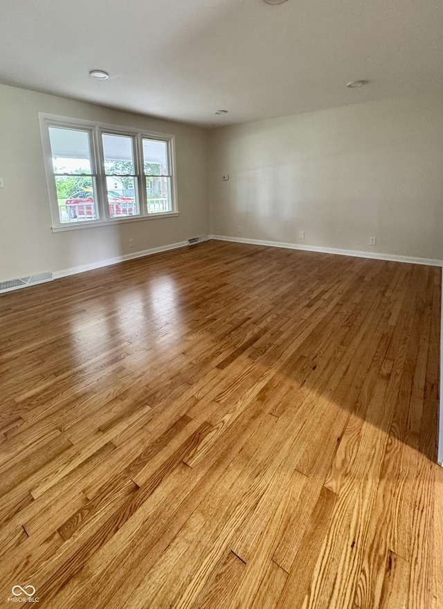 1400 Evelyn Ln, Anderson, IN 46017 - unfurnished room featuring wood finished floors