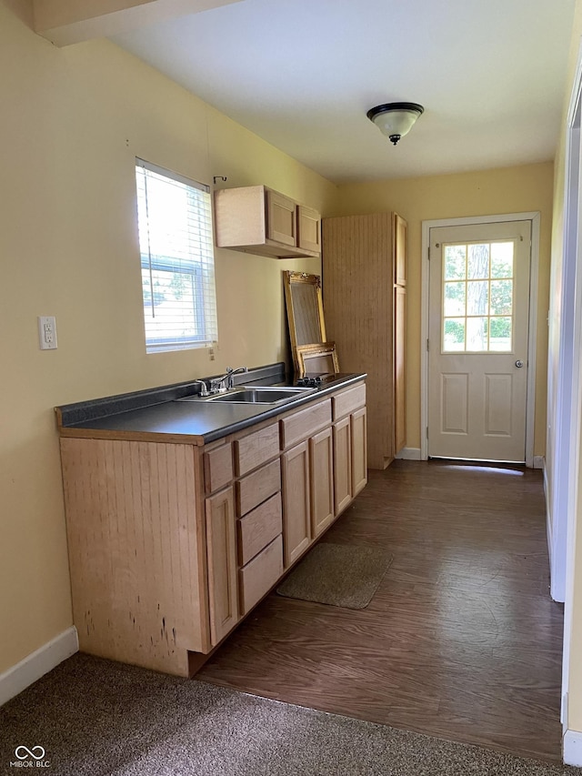 1400 Evelyn Ln, Anderson, IN 46017 - kitchen featuring dark countertops and light brown cabinets